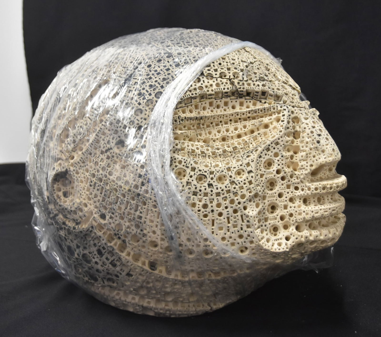 ALEXANDER NEY TERRACOTTA LARGE HEAD SCULPTURE: ALEXANDER NEY (RUSSIAN / AMERICAN, b. 1939) RETICULATED TERRACOTTA SCULPTURE OF LARGE HEAD - 16" x 7 1/2" x 13" (IS BROKEN IN HALF ; APPEARS TO BE CLEAN BREAK)