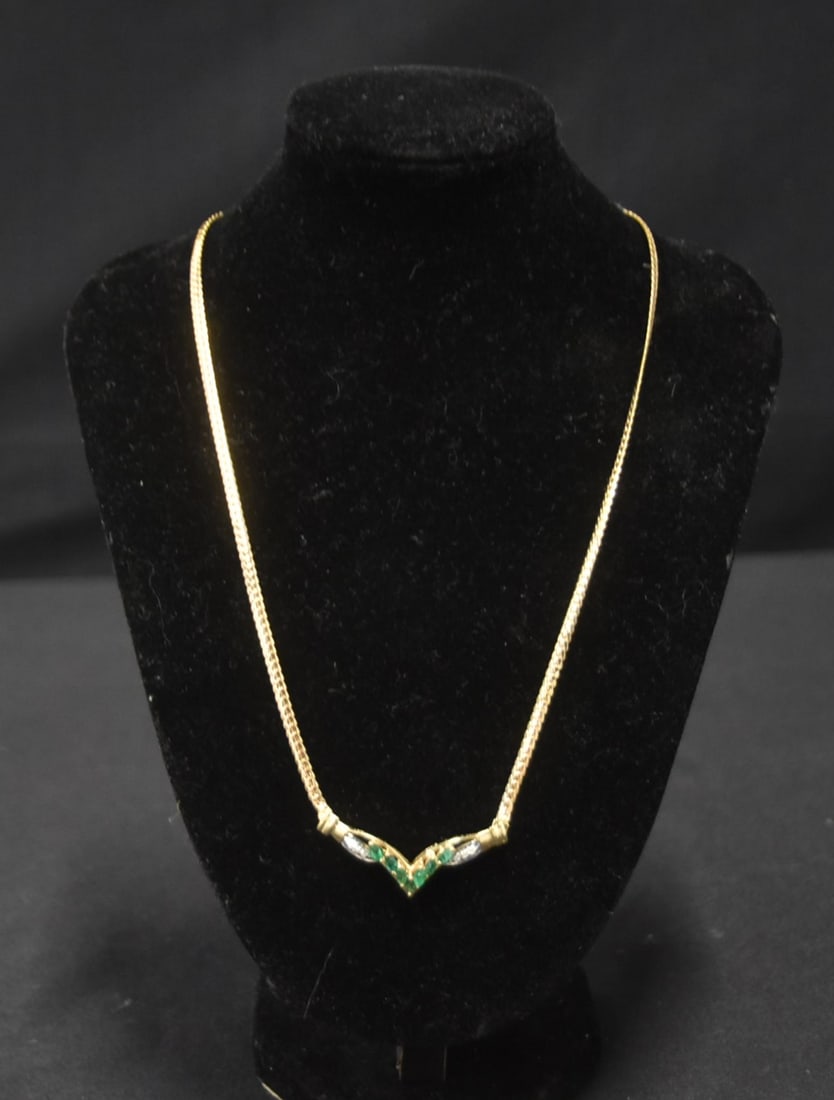 14kt GOLD EMERALD & DIAMOND CHEVRON NECKLACE: 14kt GOLD (7) EMERALD & (6) DIAMOND CHEVRON NECKLACE - 17" LONG ; 6.2grams