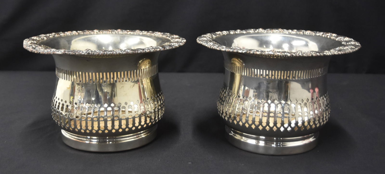 (Pr) SHEFFIELD SILVER PLATE CHAMPAGNE COASTERS: PAIR RETICULATED SHEFFIELD ENGLAND SILVER PLATE CHAMPAGNE - WINE BOTTLE COASTERS WITH FLORAL RIM & WOOD INSERT - 8 1/2" x 5 1/2"