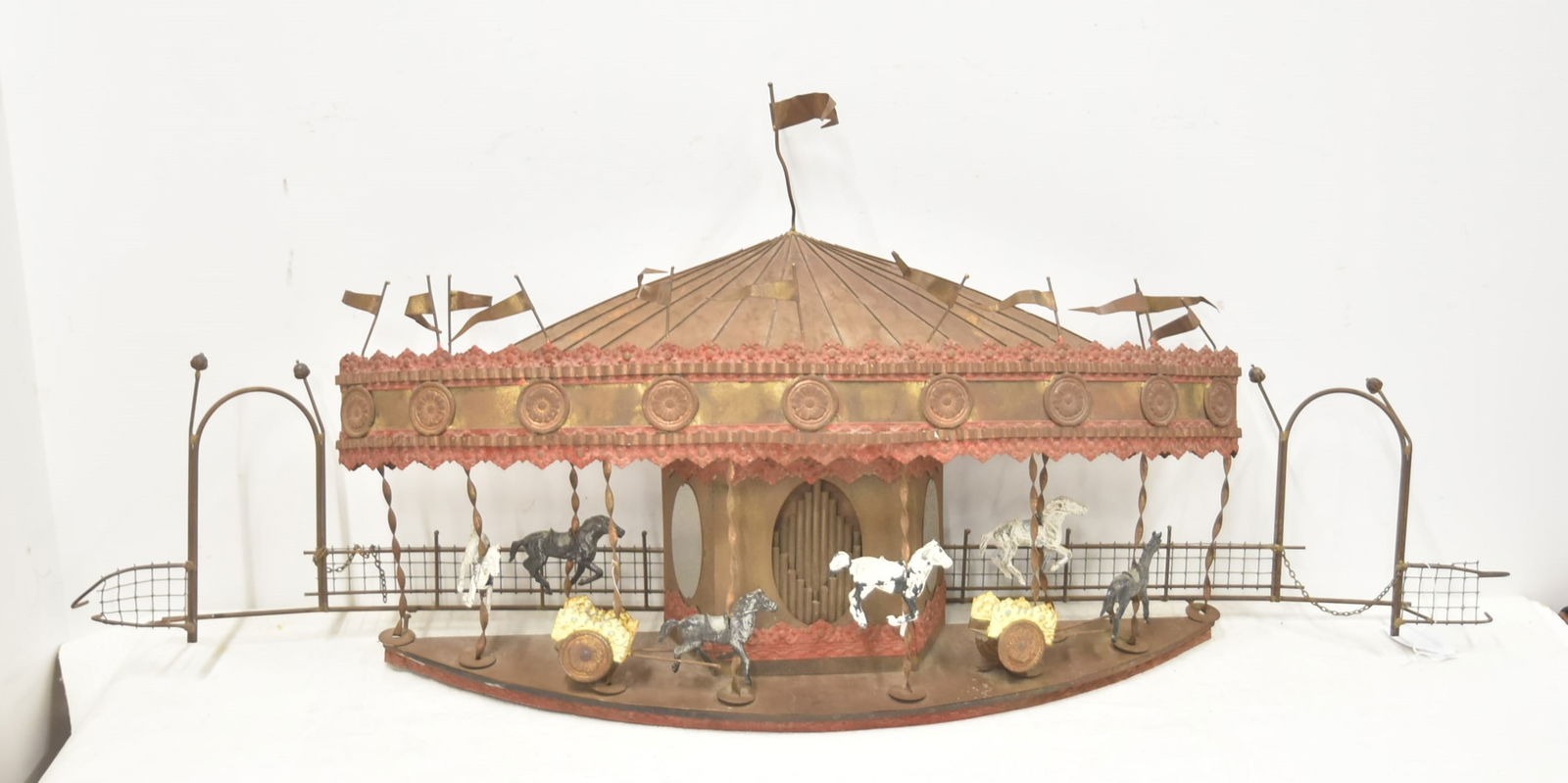 CURTIS JERE "MERRY GO ROUND" WALL SCULPTURE: CURTIS JERE ; C. JERE METALWORK WALL SCULPTURE , 1969 , MODERNIST ; BRUTALIST "MERRY GO ROUND" CAROUSEL WALL SCULPTURE SIGNED C. JERE - 46" x 8" x 20" WALL MOUNTED CAROUSEL SCULPTURE C. JERE ; CURTIS