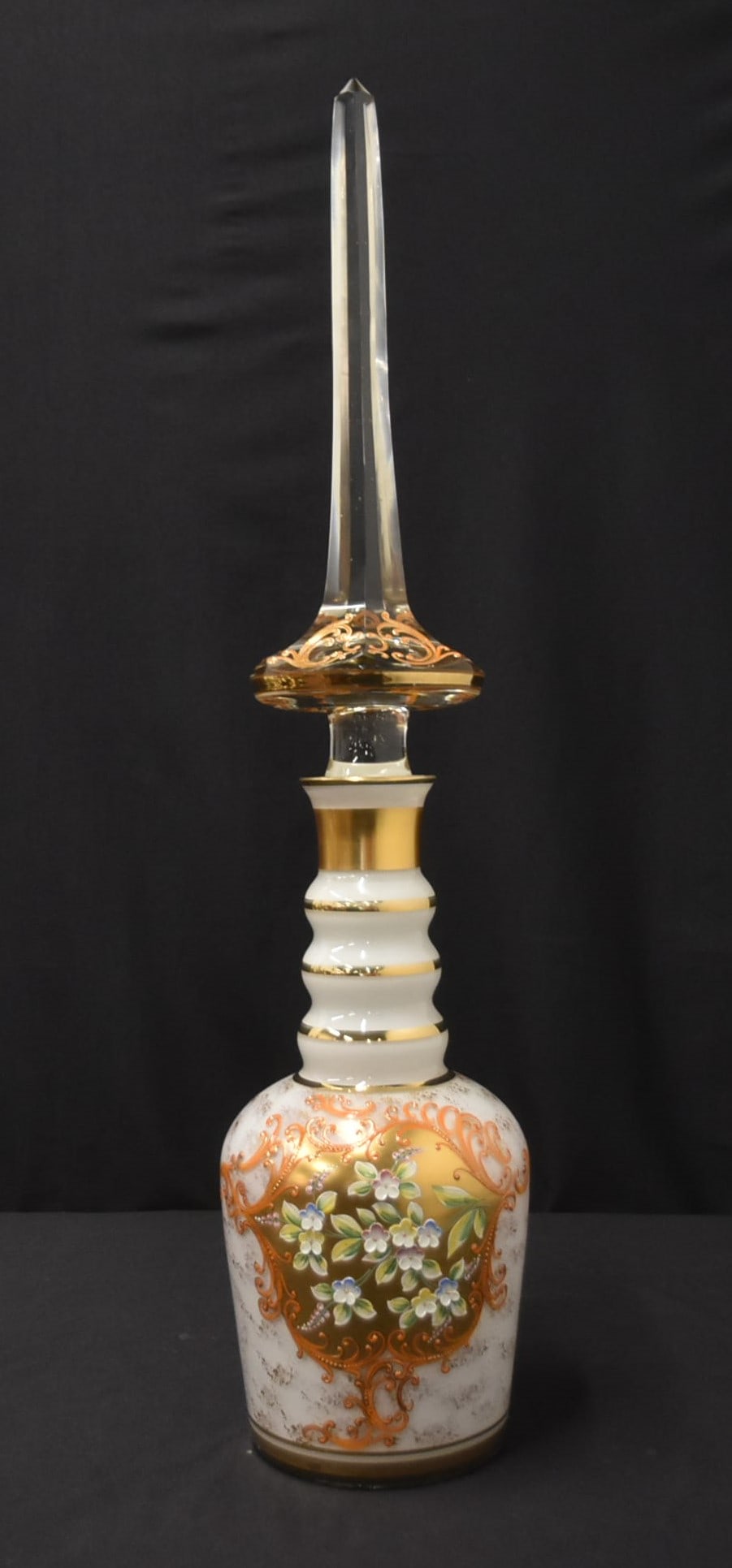 BOHEMIAN ENAMELED GLASS SPIKE DECANTER: BOHEMIAN CZECHOSLAVAKIA ENAMELED GLASS SPIKE DECANTER WITH RAISED FLORAL ENAMEL - 7" x 28"