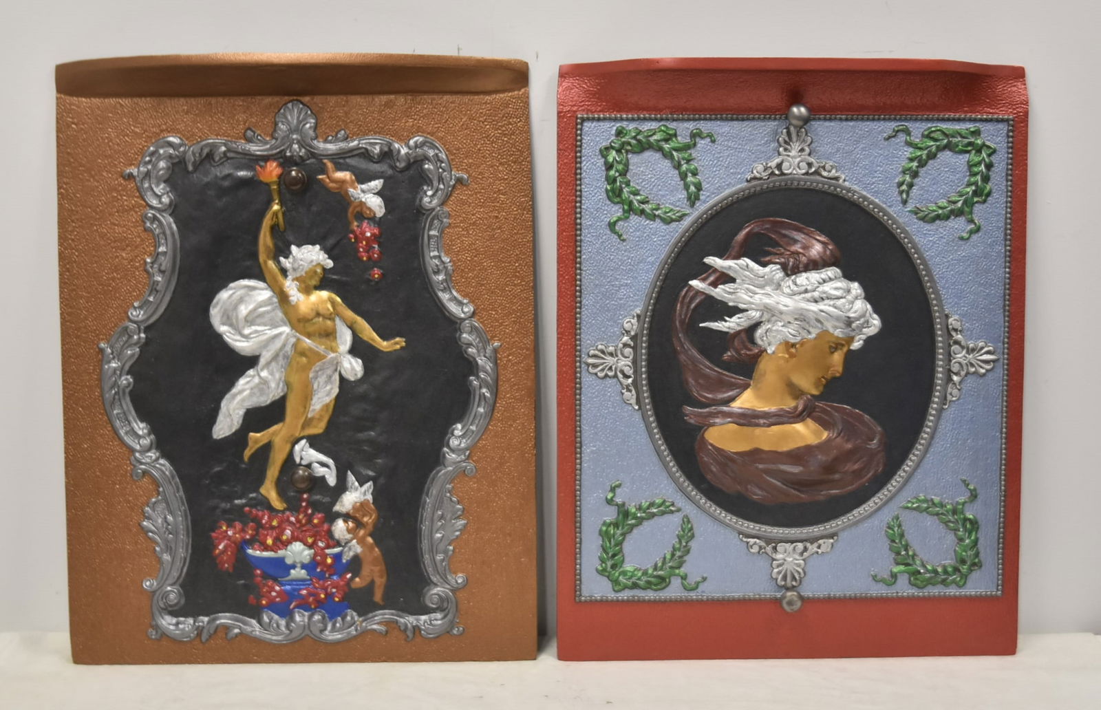 (2) COLD PAINTED IRON FIREPLACE PLACE SCREENS: (2) COLD PAINTED IRON FIREPLACE INSERTS COLD PAINTED FIRE PLACE INSERT WITH PORTRAIT OF ART NOUVEAU WOMAN / COLD PAINTED FIREPLACE INSERT WITH CHERUBS & FLAMES - LARGEST IS 20" x 25 1/2"