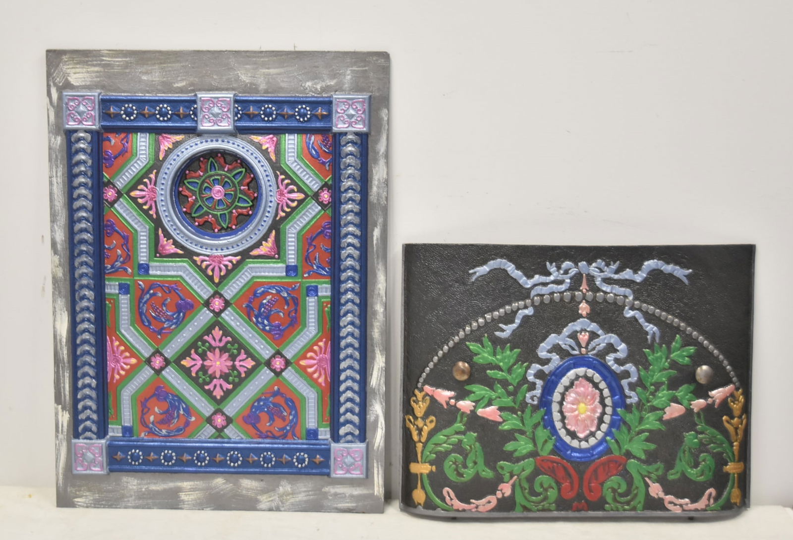 (2) ANTIQUE COLD PAINTED FIREPLACE INSERTS: (2) ANTIQUE COLD PAINTED FIREPLACE - WOOD BURNING STOVE INSERT COVERS FIREPLACE INSERT WITH GEOMETRIC DESIGNS / FIREPLACE INSERT WITH GARLANDS & MEDALLION - LARGEST IS 19" x 26" (PAINTING IS