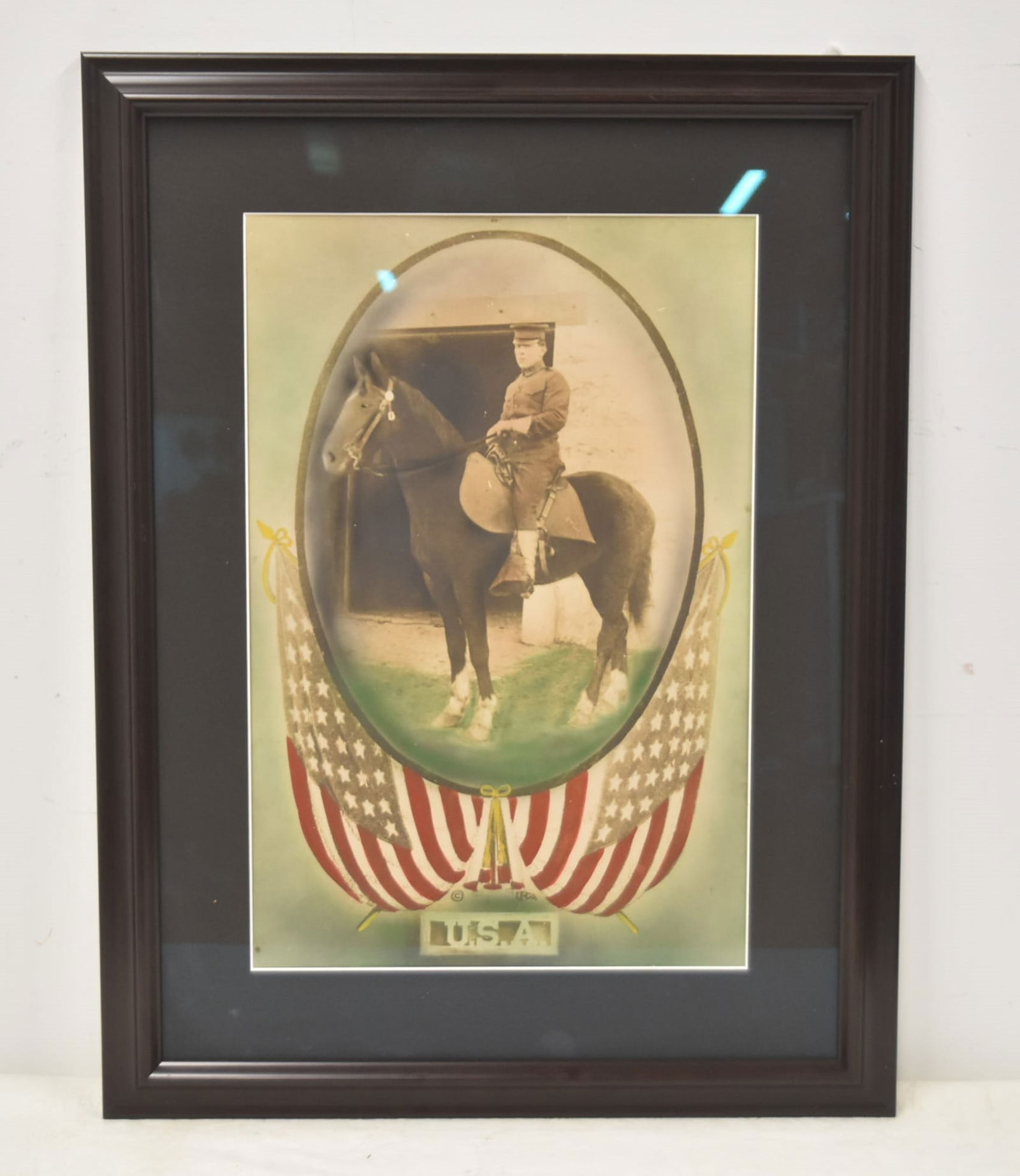 USA AMERICAN SOLDIER ON HORSEBACK: USA AMERICAN EMBELLISHED LITHOGRAPH PORTRAIT OF WORLD WAR I PORTRAIT OF GERMAN SOLDIER ON HORSEBACK WITH EMBELLISHED AMERICAN FLAG - IMAGE IS 12" x 18" 20" x 26" OVERALL