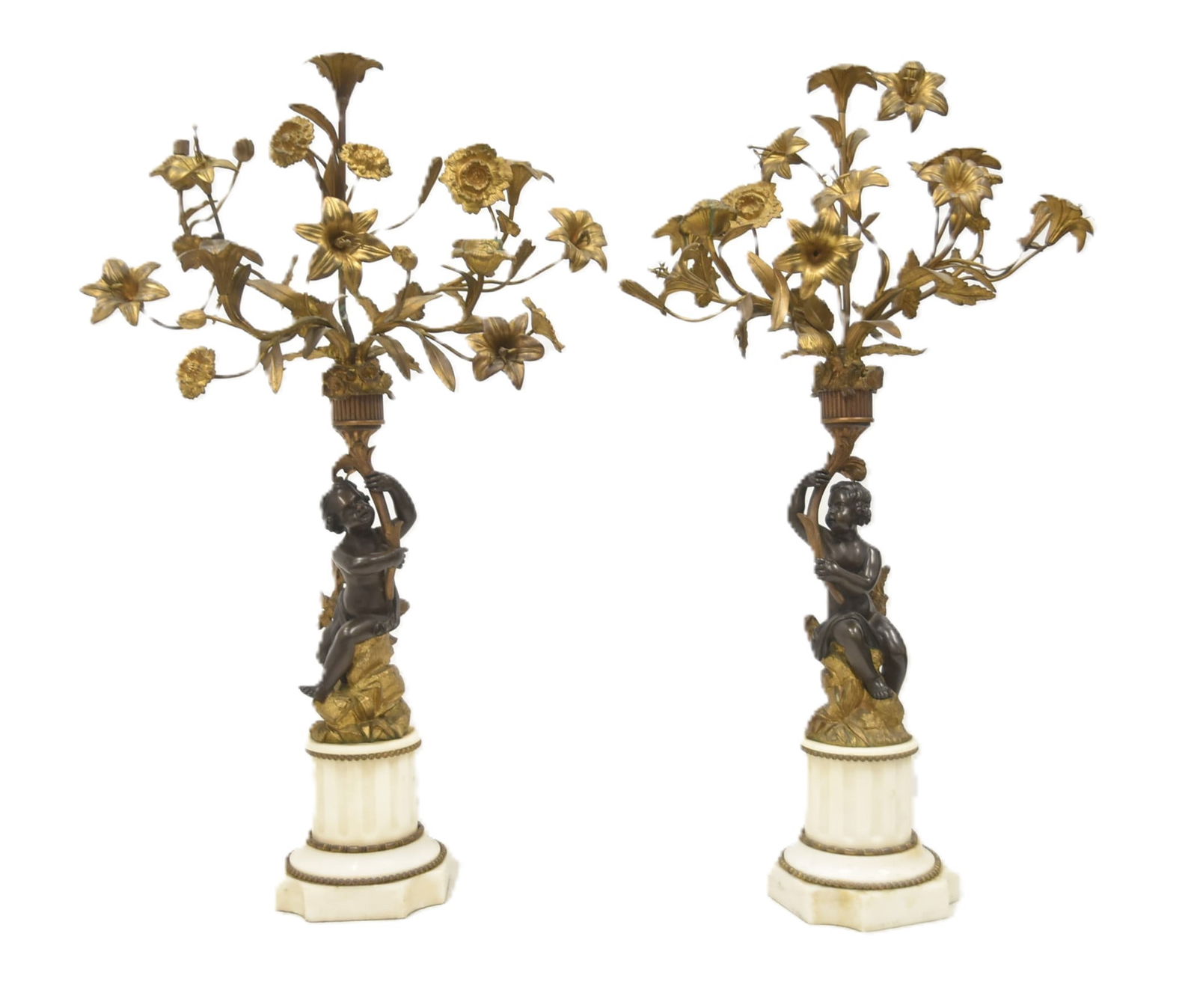 (Pr) FRENCH BRONZE & MARBLE CANDELABRAS: PAIR FRENCH BRONZE PUTTOS HOLDING BRONZE FOLIATE CANDELABRAS ; RAISED ON MARBLE BASE - 11" x 12" x 18"