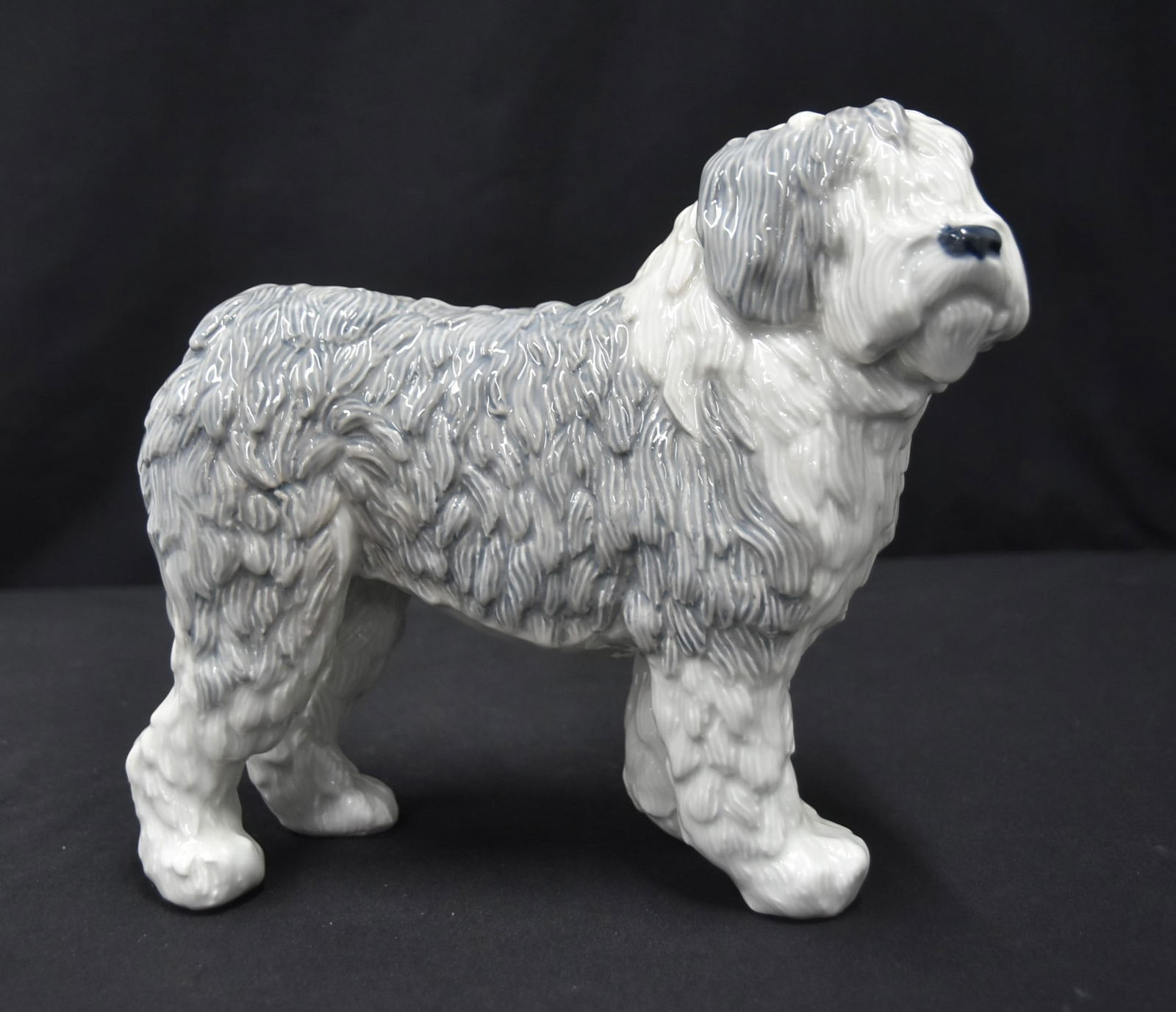 ROYAL COPENHAGEN 4952 OLD ENGLISH SHEEP DOG: ROYAL COPENHAGEN # 4952 OLD ENGLISH SHEEP DOG FIGURINE ; DESIGNED BY JEANNE GRUT - 8" x 4 1/2" x 8 1/2" (SMALL FIRING CRACK ON SIDE)