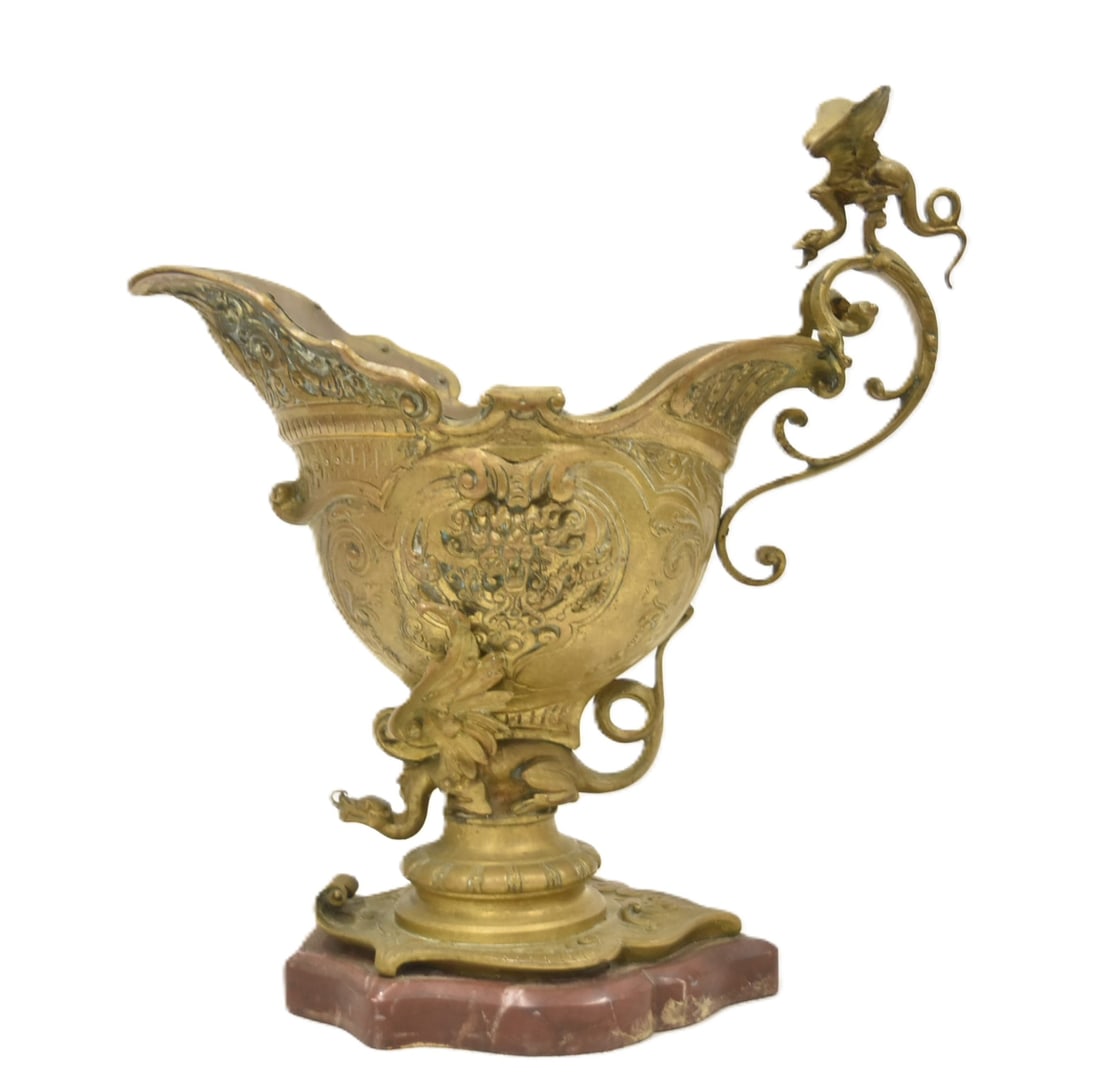 BRONZE & MARBLE NAUTILUS BOWL: BRONZE NAUTILUS CENTERPIECE BOWL WITH RAISED RELIEF MASKS & DRAGONS PERCHED ON HANDLE & BASE ; RAISED ON ROUGE MARBLE BASE - 15" x 7" x 16"