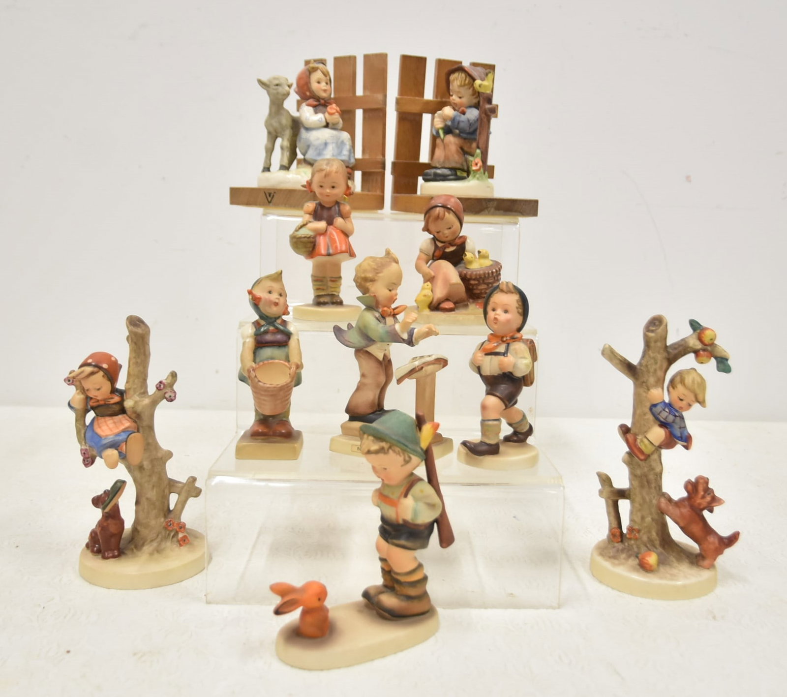 (10) GOEBEL HUMMEL FIGURINES: (Pr) HUMMEL GOODFRIENDS BOOKENDS / PAIR HUMMEL APPLE TREE GIRL & BOY FIGURINES / GIRL WITH CHICKS / GIRL WITH BASKET / SCHOOL BOY & GIRL / BOY WITH RABBIT - SMALLEST IS 3 1/2" TA;; - LARGEST IS 6 3/4"
