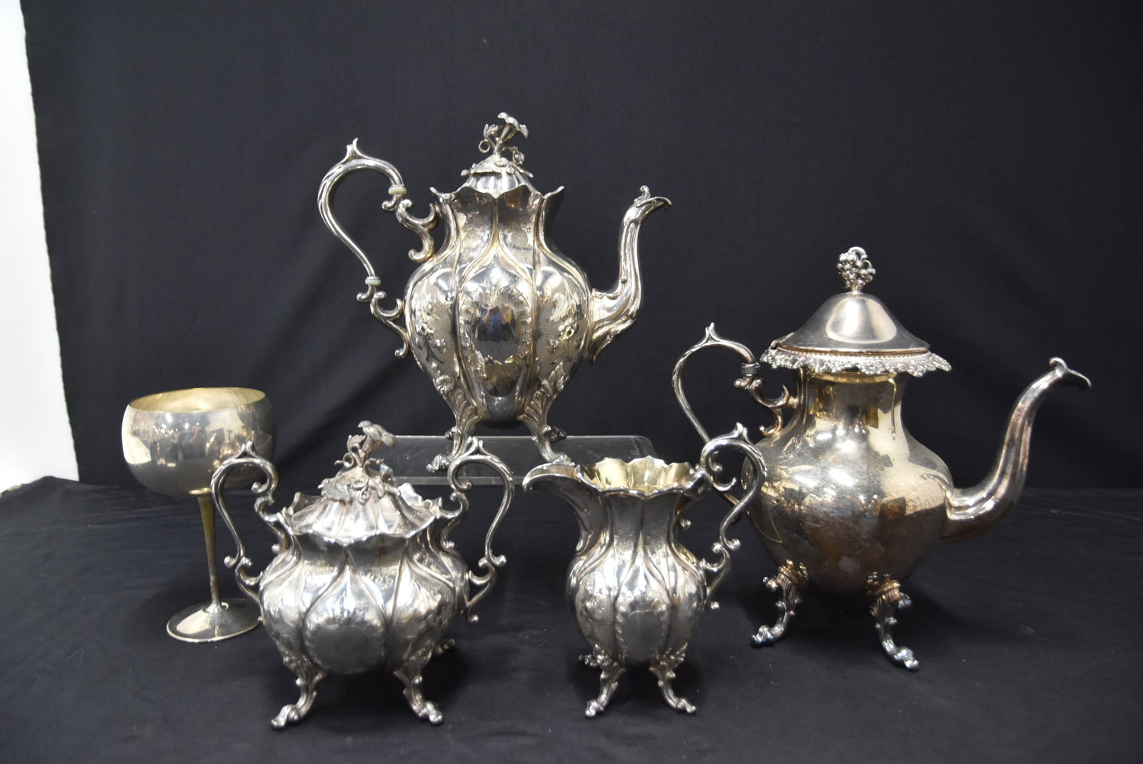 (3)pc SILVER PLATE TEA SET / GOBLET & COFFEE POT: (3)pc SILVER PLATE TEA SET ITALIAN SILVER PLATE GOBLET / SILVER PLATE COFFEE POT - LARGEST POT IS 10" x 5" x 10 1/2"
