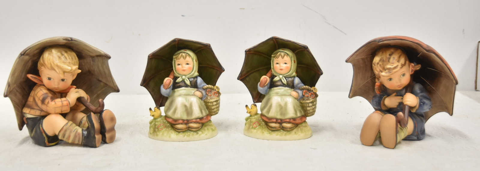 (4) HUMMEL PORCELAN FIGURINES (1 of 17)