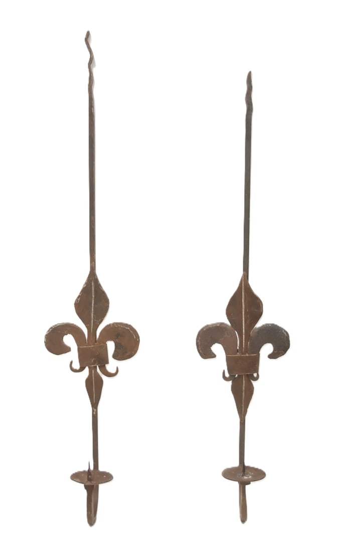 JAN BARBOGLIO , (Pr) FORGED WROUGHT IRON SCONCES: JAN BARBOGLIO (MEXICO, 20thC) PAIR FORGED WROUGHT IRON CANDLE PRICKET WALL SCONCES WITH FLEUR DE LIS - 7 1/2" x 38" ; WITH JAN BARBAGIO LABEL (2) DIFFERENT SIZES
