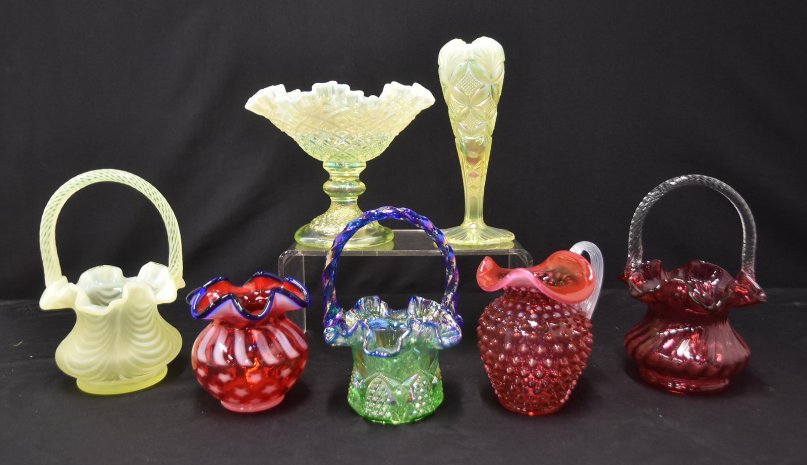 (7)pc FENTON GLASS COLLECTION: FENTON GENERATION COLLECTION RUFFLED PEDESTAL BOWL / OPALESCENT / CRANBERRY BASKET / RED & BLUE BASKET / OPALESCENT VASE / CRANBERRY OPALESCENT PITCHER /FENTON BUTTON & ARCH BASKET - LARGEST IS 7" x 6