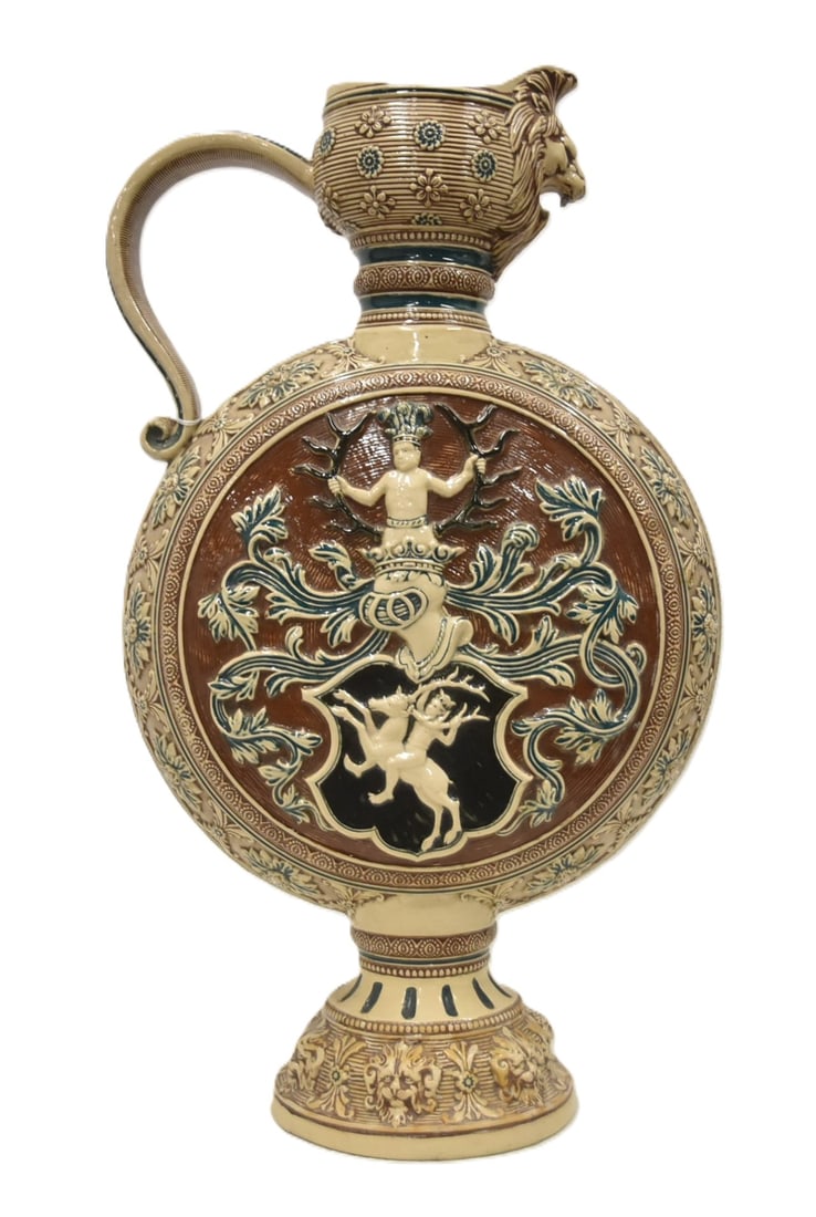 PALATIAL GERMAN MOON FLASK EWER: VERY LARGE GERMAN STONEWARE MOON FLASK EWER WITH LION HEAD SPOUT HAVING HERALDIC FAMILY CREST & BOY WITH ANTLER CROWN - 14" x 8" x 24 1/2" (BASE HAS RESTORATION)