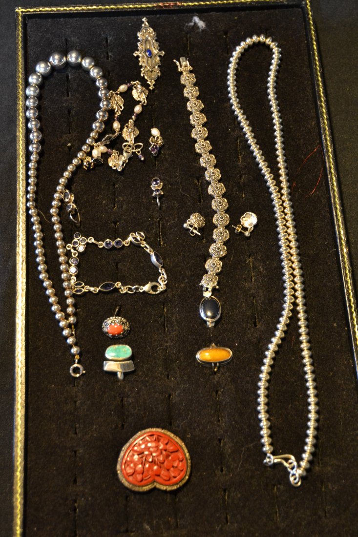 ASSORTED SILVER COSTUME JEWELRY CONSISTING OF: (4) RINGS ,(3) BRACELETS, (2) STRANDS OF BEADS , (3)pr's OF EARRINGS, PIN & CINNABAR PIN