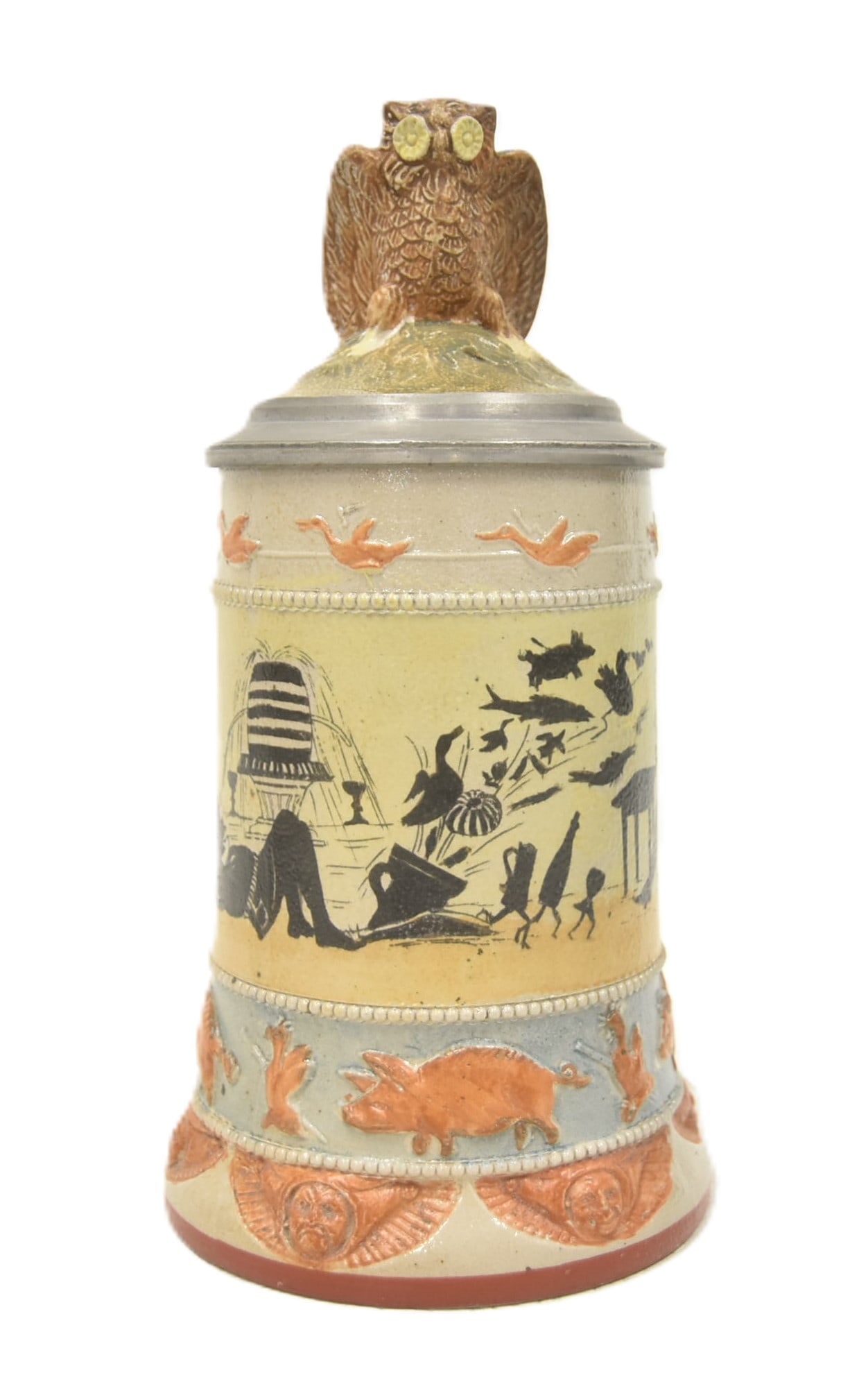 LB & Co. 1/2 LITER GERMAN STEIN: L BAUERNFREUND & Co LB & C SCHLARAFFENLAND HAUBER & REUTHER OVER PAINTED SALT GLAZED STONEWARE STEIN WITH SILHOUTTES OF FIGURES , PIGS , DUCKS & FACES WITH OWL FINIAL LID & GECKO LIZARD HANDLE 4 1/2"