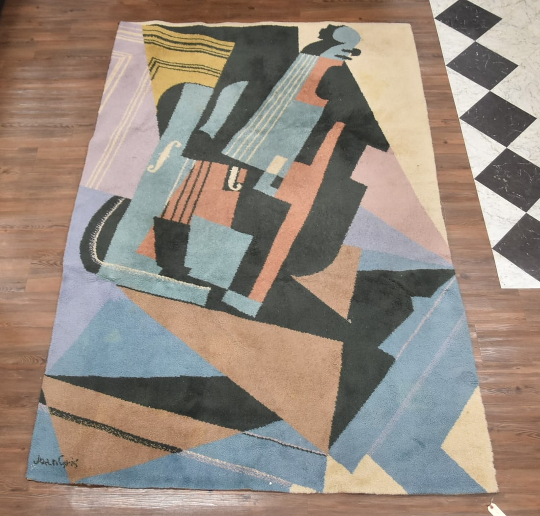 JUAN GRIS EGE AXMINSTER WOOL RUG - 6' x 9': EGE AXMINSTER VIOLA WOOL RUG FROM THE 1990s ART LINE COLLECTION ; AFTER CUBIST PAINTING BY JUAN GRIS - 6' x 9' SIGNED JUAN GRIS ON LOWER EDGE ; WITH ABSTRACT GEOMETRIC FORMS & MUSICAL MOTIF