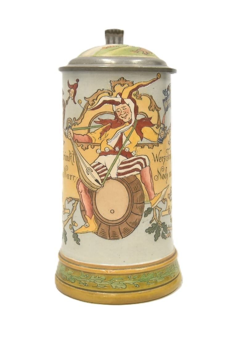 HR 436 DRUNKEN JESTER ON BARREL: HAUBER & REUTHER No. 436 DRUNKEN JESTER ON BARREL 1/2 LITER STEIN ca 1890 WITH VERSE TRANSLATED (He who drinks too much is a fool. He who hates to drink is yet a bigger one!) 5" x 3 3/4" x 8"