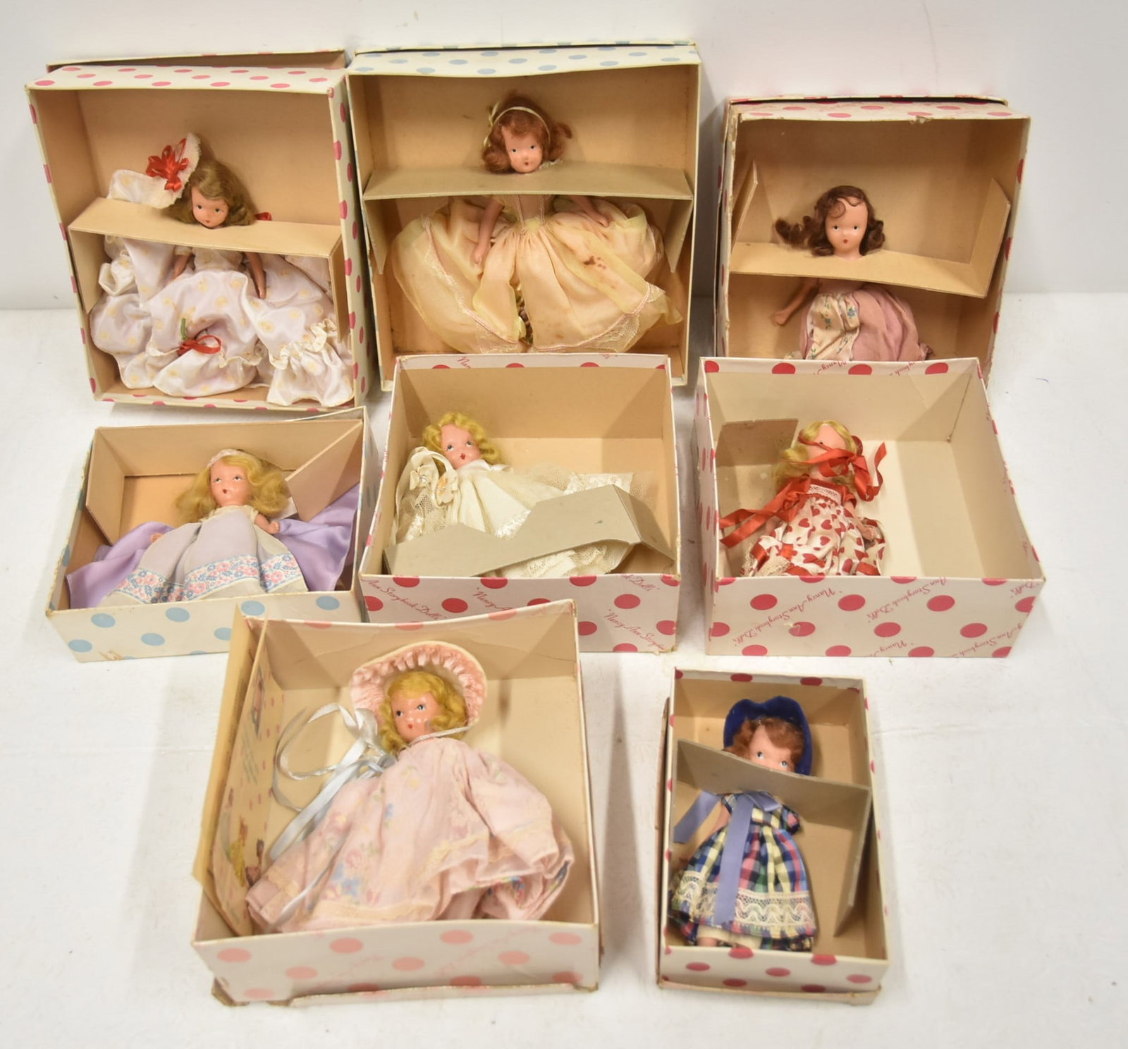 (8) NANCY ANN STORYBOOK DOLLS: (8) NANCY ANN STORYBOOK DOLLS INCLUDING POLLY PUT THE KETTLE ON / FOR DECEMBER JUST A DEAR / ROSES ARE RED / MARY HAD A LITTLE LAMB / QUEEN OF HEARTS / JENNA SET TABLE ; UNMARKED