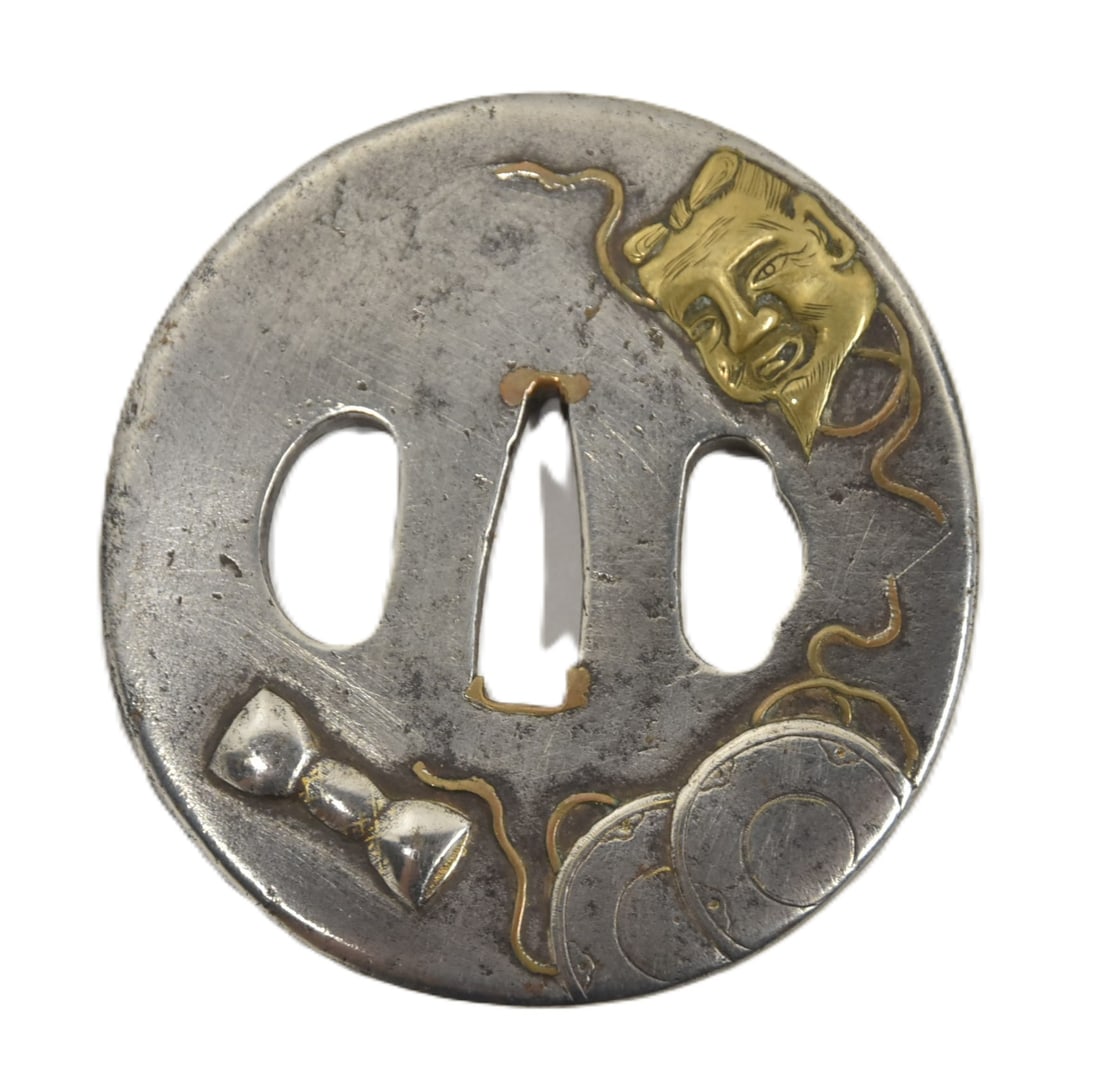 2-TONE ANTIQUE JAPANESE TSUBA WITH MASKS: ANTIQUE JAPANESE TSUBA IRON SWORD GUARD FITTING WITH MASKS - 3" D