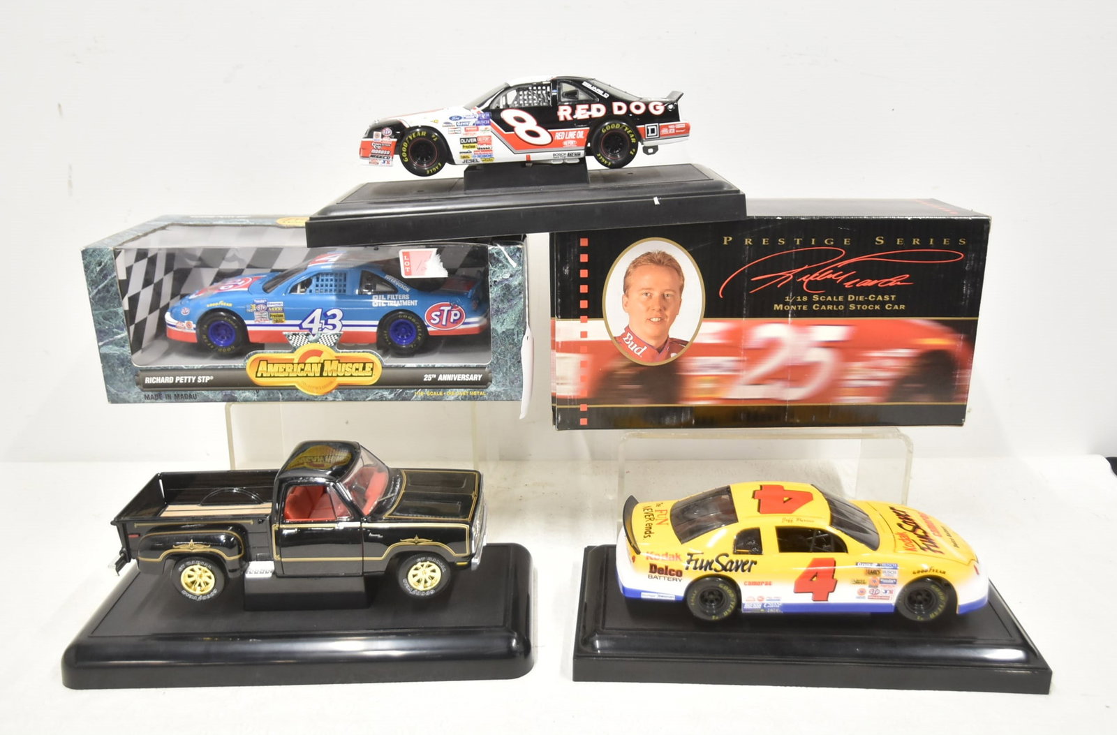 (5) ERTL DIE CAST CARS: ERTL AMERICAN MUSCLE SERIES NASACAR RICHARD PETTY 25th ANNIVERSARY NASCAR STOCK CAR THUNDERBIRD / ERTL MONTE CARLO RICKY CRAVEN NASCAR STOCK CAR / DODGE ADVENTURER PICKUP TRUCK / ERTL DIE CAST MODEL
