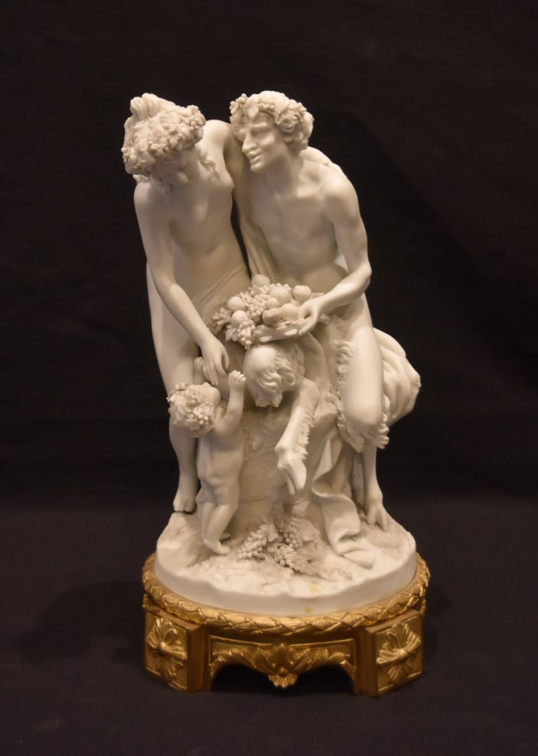 BISCUIT SEVRES & BRONZE FAUN GROUPING FIGURE: AFTER CLAUDE MICHEL CLODION SEVRES BISCUIT PORCELAIN FIGURE OF SATYR, NYMPH & PUTTO "FAMILLE de FAUNE" ; WITH BRONZE BASE ; MARKED CLODION ; SEVRES WITH F INSIDE SEVRES MARK - 6 1/2' x 12" (PLEASE NOT