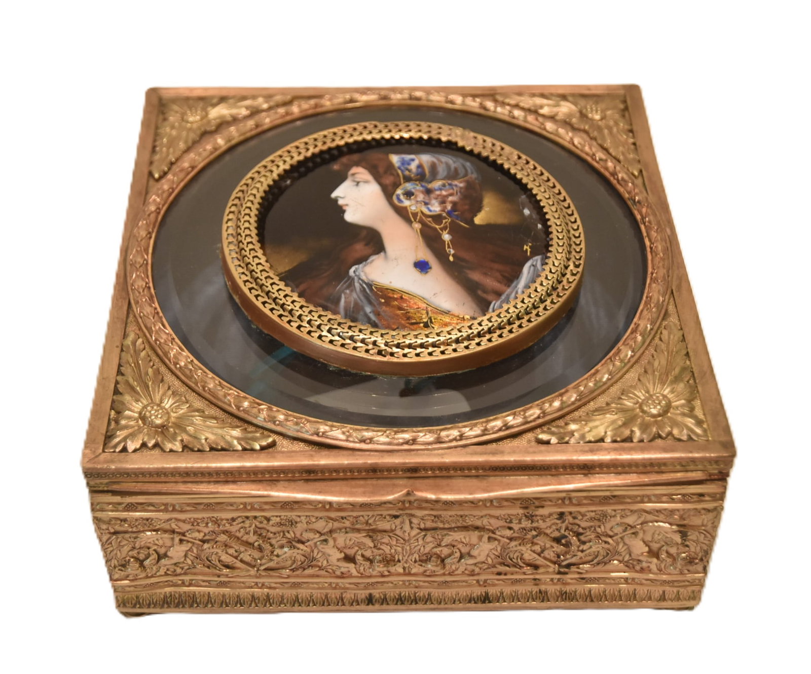 FRENCH BRONZE & LIMOGES ENAMEL PORTRAIT BOX: FRENCH BRONZE BOX WITH EMBOSSED PUTTOS ALL AROUND ; HAVING LIMOGES ENAMEL ON COPPER PORTRAIT OF ART NOUVEAU WOMAN MEDALLION ON BEVELED GLASS TOP - 7" x 7" x 3 1/2' (LIMOGES PORTRAIT HAS TOUCHED UP CHI
