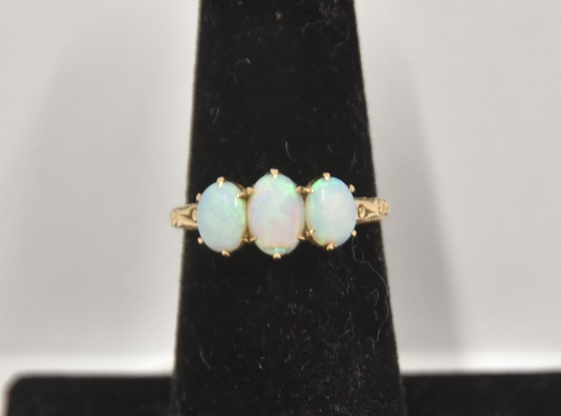 14kt YELLOW GOLD & FIERY OPAL RING: 14kt YELLOW GOLD RING WITH (3) FIERY OPAL STONES - SIZE 6 1/2 ; 2gram