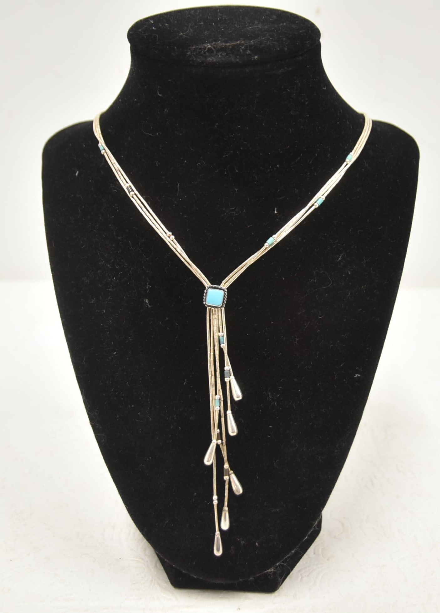 NATIVE AMERICAN STERLING Y SHAPED NECKLACE: NATIVE AMERICAN Y SHAPED LIQUID STERLING SILVER ROPE FORM Y NECKLACE WITH TURQUOISE STATIONS - 17" LONG ; WITH 4" DROP ; 11.2grams