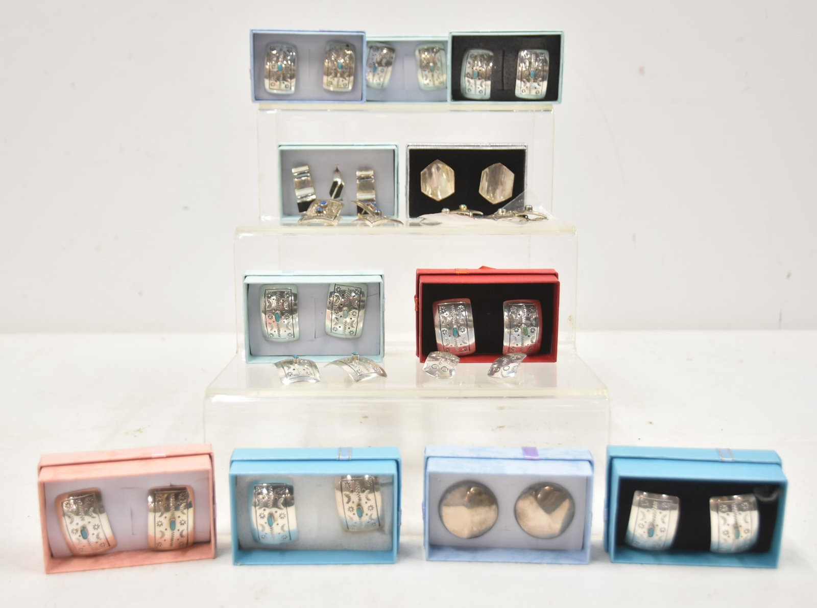 (16) PAIRS TAXCO STERLING SILVER EARRINGS: (16) PAIRS BRAND NEW NEVER WORN TAXCO NATIVE AMERICAN DESIGN STERLING SILVER EARRINGS INCLUDING SOME WITH TURQUOISE STONES ; SOME MODERNIST STYLE INCLUDING STERLING & BLACK ONYX EARRINGS & RING SUITE