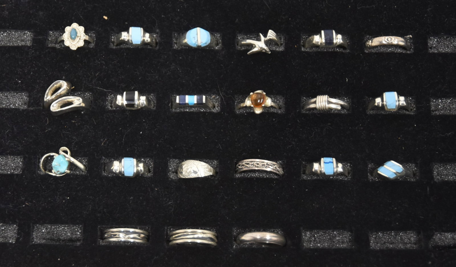 (21) TAXCO STERLING SILVER RINGS: (21) TAXCO STERLING SILVER RINGS INCLUDING SOME WITH TURQUOISE ; SOME WITH LAPIS MOSTLY SIZE 8- 9 ; 2.16ozt