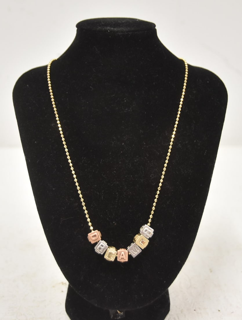 COACH GOLD TONE DREAMER NECKLACE: LIKE NEW COACH DESIGNER GOLD TONE NECKLACE WITH DREAMER CUBE BLOCKS 16" LONG