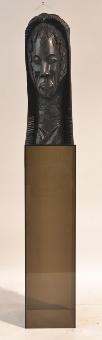 HAITIAN CARVING BUST OF MAN ON LUCITE PEDESTAL: CARVING IS 25" TALL