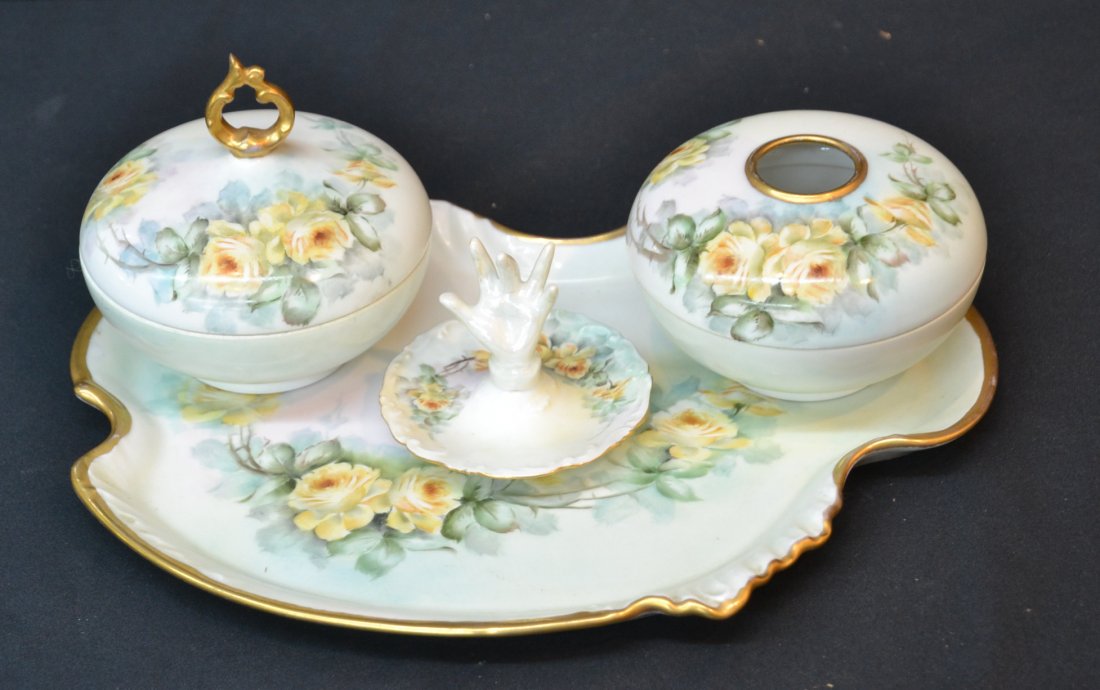 HAND PAINTED T.V. LIMOGES DRESSER SET CONSISTING: OF COVERED POWDER, HAIR RECEIVER , RING HOLDER & TRAY - TRAY IS 13"