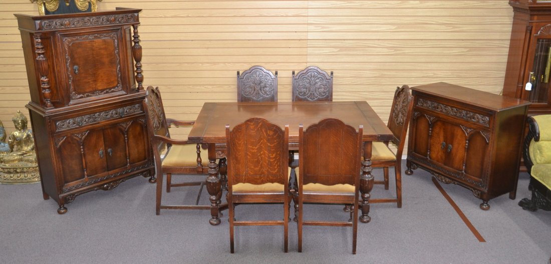 CARVED OAK DINING ROOM SET CONSISTING OF: TRESTLE TABLE WITH (6) CHAIRS, SILVER CHEST WITH COLUMNS & SERVER - CHEST IS 38" x 17" x 64" , TABLE IS 59 1/2" x 39 1/2" x 30"