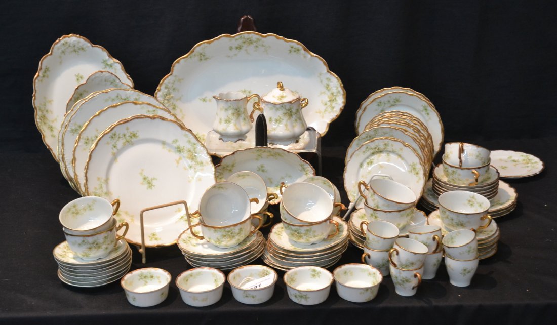 (93)pc ELITE WORKS LIMOGES DINNER WARE SERVICE: CONSISTING OF (9) dinner plates, (6) luncheon plates, (16) cake plates, (4) platters, sugar & covered sugar, (5) ramikens,(8) cups, (16) saucers (6) boullion cups, (7) saucers, (8) demitasse & (6) ber