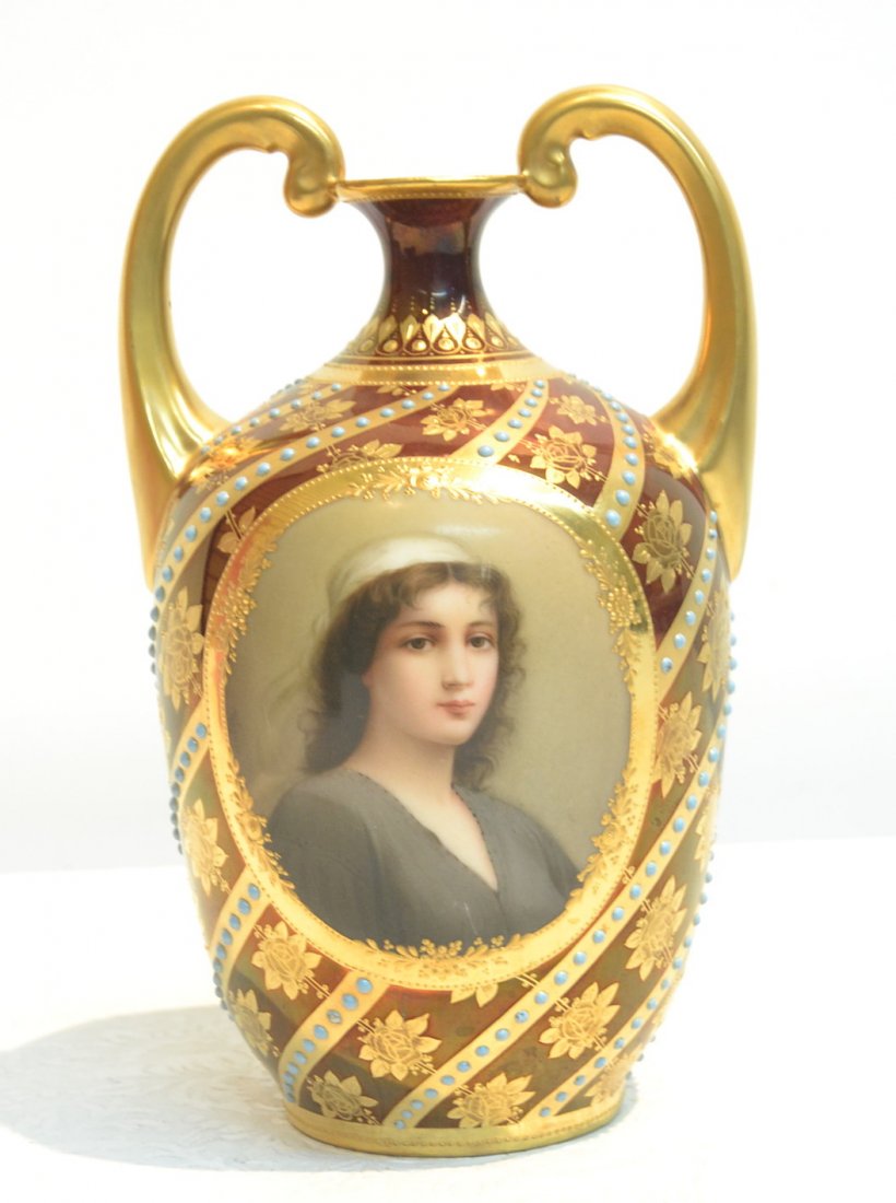 HAND PAINTED ROYAL VIENNA TWIN HANDLE PORTRAIT: VASE DEPICTING RUTH SURROUNDED GILT FLOWERS & RAISED JEWELS OVER MAROON GROUND ; ARTIST SIGBED WAGNER (DRILLED) 5" x 8 1/2'