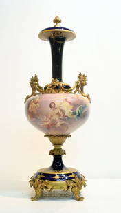 UNUSUAL FORM 2-PART 19thC SEVRES COVERED URN: WITH ALLEGORICAL SCENE ALL AROUND & COBALT GROUND WITH GOLD DECORATIONS ADORNED WITH BRONZE LEAFY HANDLES & MOUNTS - 12" x 34"