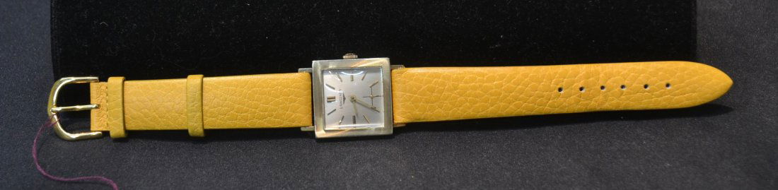 14kt LONGINES MECHANICAL WATCH WITH YELLOW: BAND - DIAL IS 1" x 1" - 8 1/2" LONG