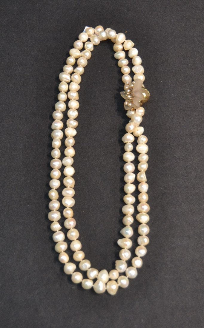 DOUBLE STRAND BAROQUE PEARL NECKLACE WITH: 14kt GOLD QUARTZ CARVED FLOWER CLASP WITH PEARLS - 22"