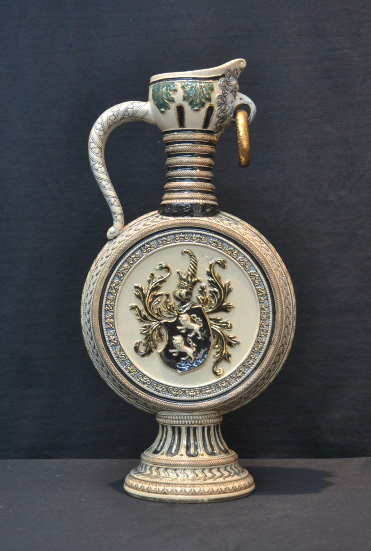 LARGE STONEWARE EWER WITH LION SHEILD  DROP RINGS