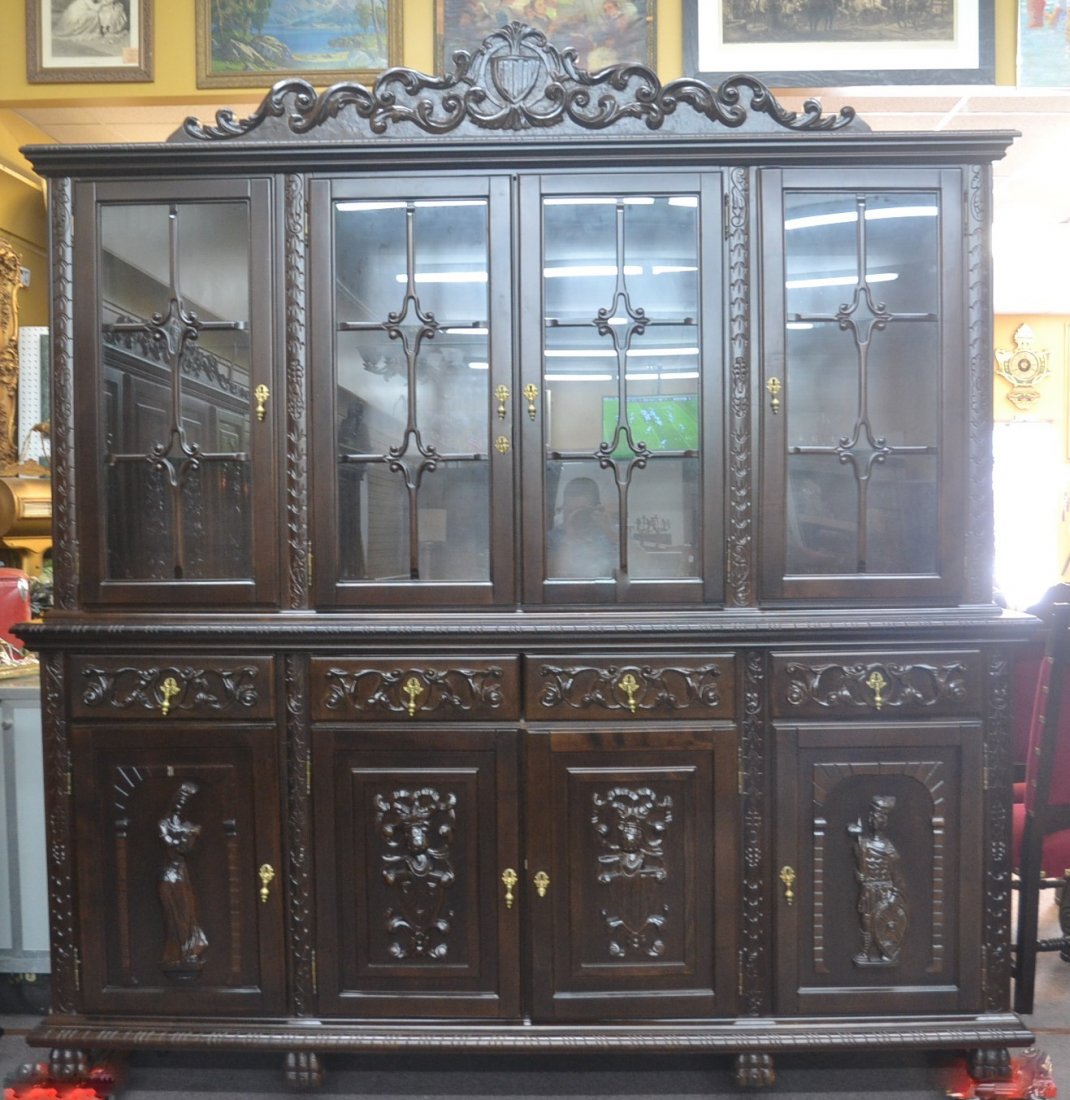 LARGE EUROPEAN CARVED HUTCH WITH GLASS DOORS &: CARVED FIGURES & SCROLLWORK SUPPORTED BY CLAW FEET - 92" x 22" x 96"