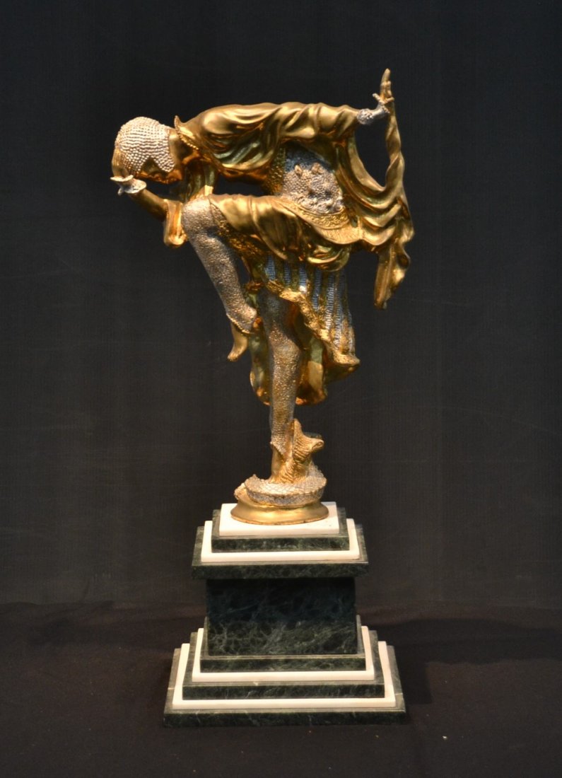 ART DECO STYLE GILT BRONZE SCULPTURE OF DANCING: WOMAN WITH TEXTURED SNAKE SKIN CLOTHING STANDING ON STEPPED MARBLE PLYNTHE ; AFTER CLAIRE JEANNE COLINET - 13" x 13" x 35"