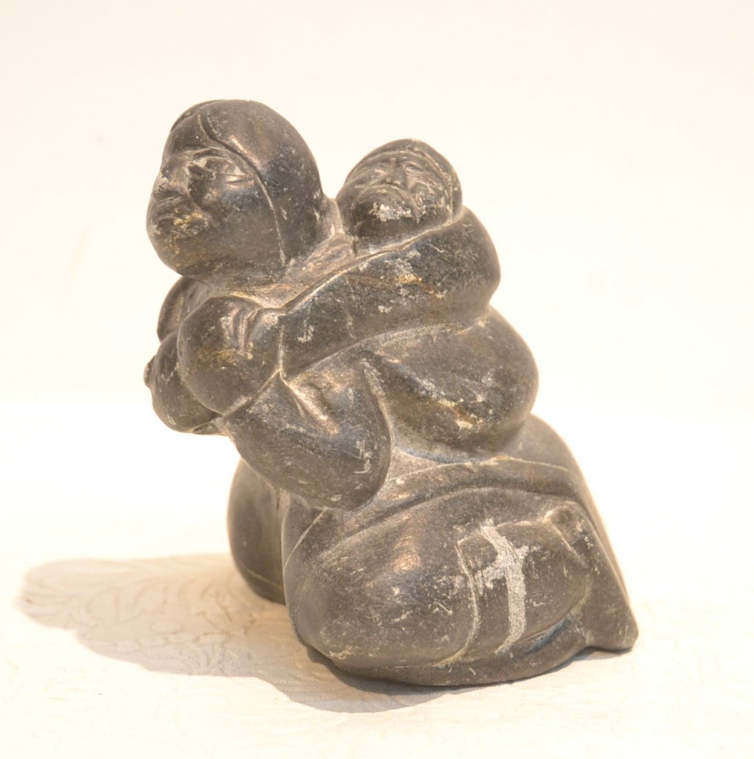 INUIT STONE WOMAN CARVING - 4" x 4": INUIT STONE WOMAN CARVING - 4" x 4"