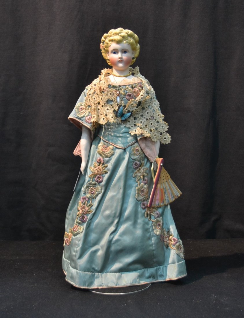 PARIAN SHOULDER HEAD DOLL WITH PIERCED EARS,: BLONDE CURLY MOLDED HAIR WITH FLOWERS, CHINA ARMS & CLOTH BODY - 19" TALL