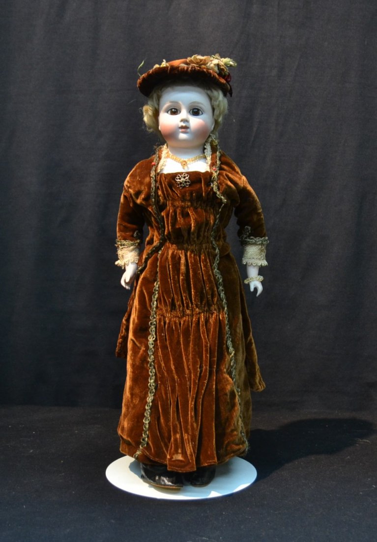 ALT, BECK & GOTTSCHALCK , BISQUE SOLID DOME HEAD: DOLL WITH BREAST PLATE ,CLOSED MOUTH , LARGE SHOULDER PLATE, BISQUE HANDS , PIERCED EARS & GUSSET KID BODY ; MARKED ABG - 18" TALL