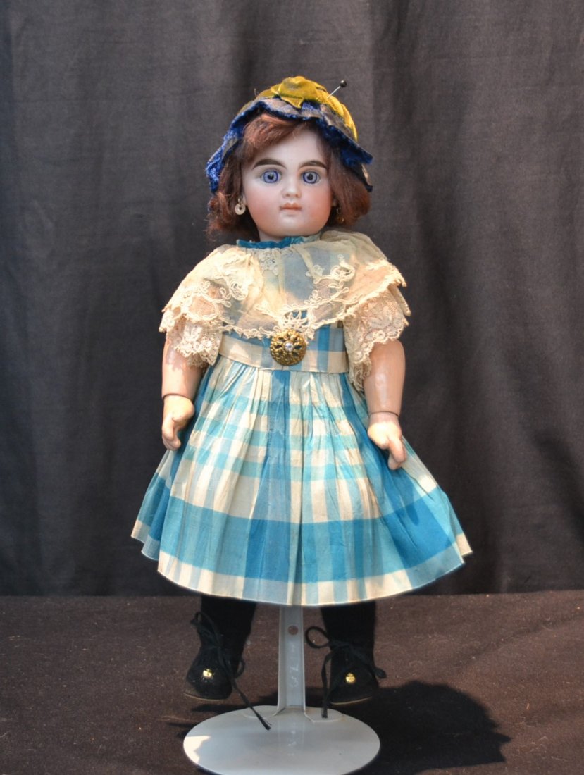 GERMAN JUMEAU FACE BISQUE HEAD DOLL: WITH CLOSED MOUTH DOLL WITH PAPERWEIGHT EYES, PIERCED EARS & JOINTED COMPOSITION BODY ; MARKED WD-7 ;HAS BEBE JUMEAU LABEL ON BODY - 13" TALL