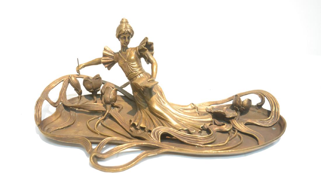 BRONZE NOUVEAU STYLE RECLINING WOMAN WITH BOOK: 13 1/2" x 7 1/2" x 5"