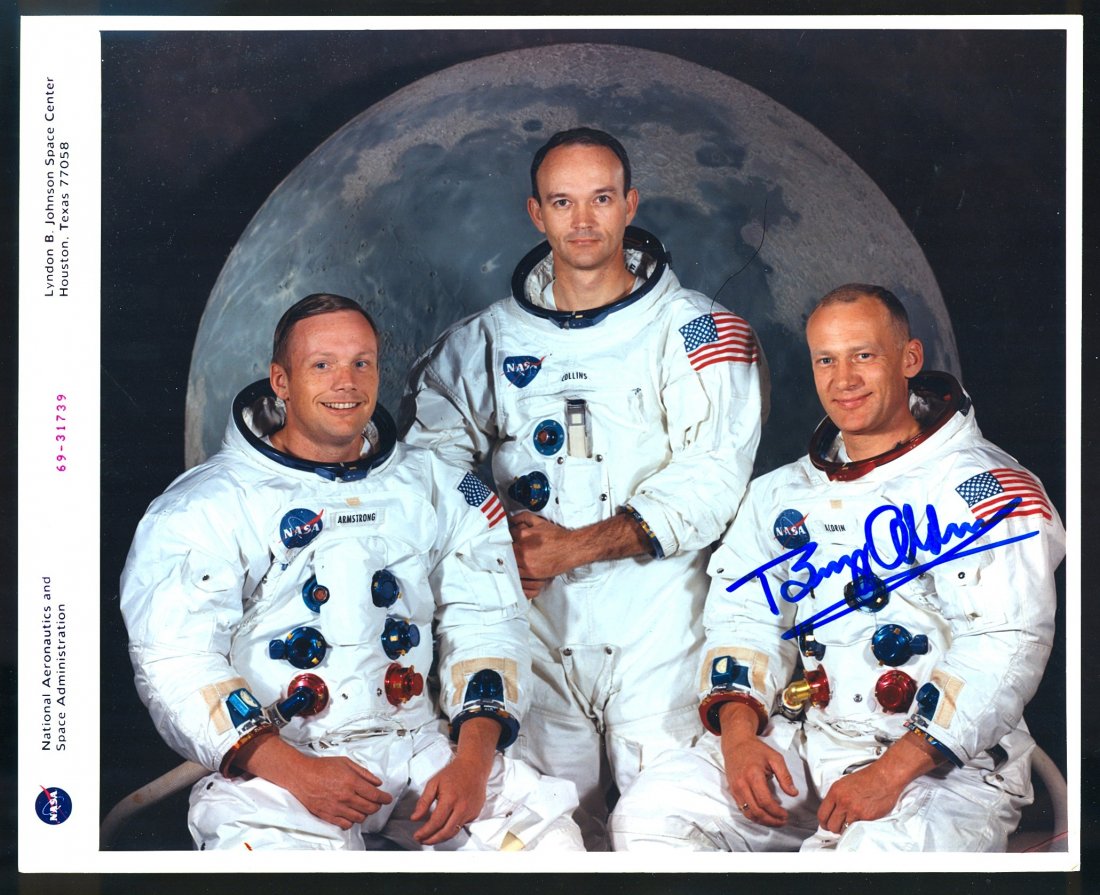 Buzz Aldrin Signed NASA Color Glossy Photo: An 8"x 10 NASA color glossy photo of the Apollo 11 crew signed by Buzz Aldrin. Excellent condition.