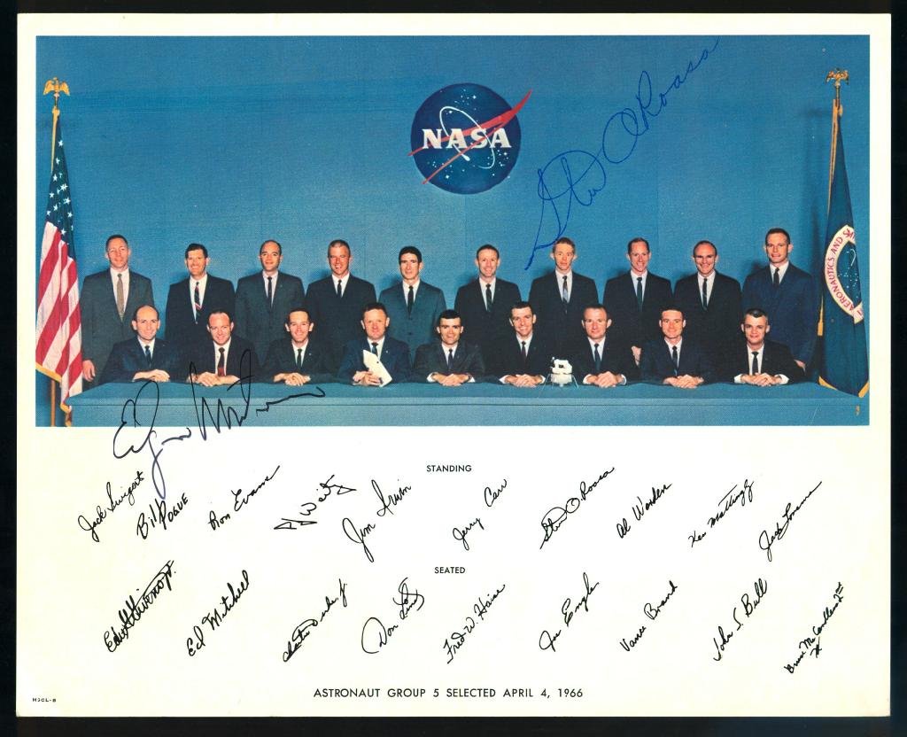 Roosa and Mitchell Signed NASA Color Litho: An original 8"x 10" NASA color litho of the Group 5 astronauts and signed by Apollo 14 astronauts Stuart Roosa and Edgar Mitchell. Some light handling flaws, but otherwise good shape.