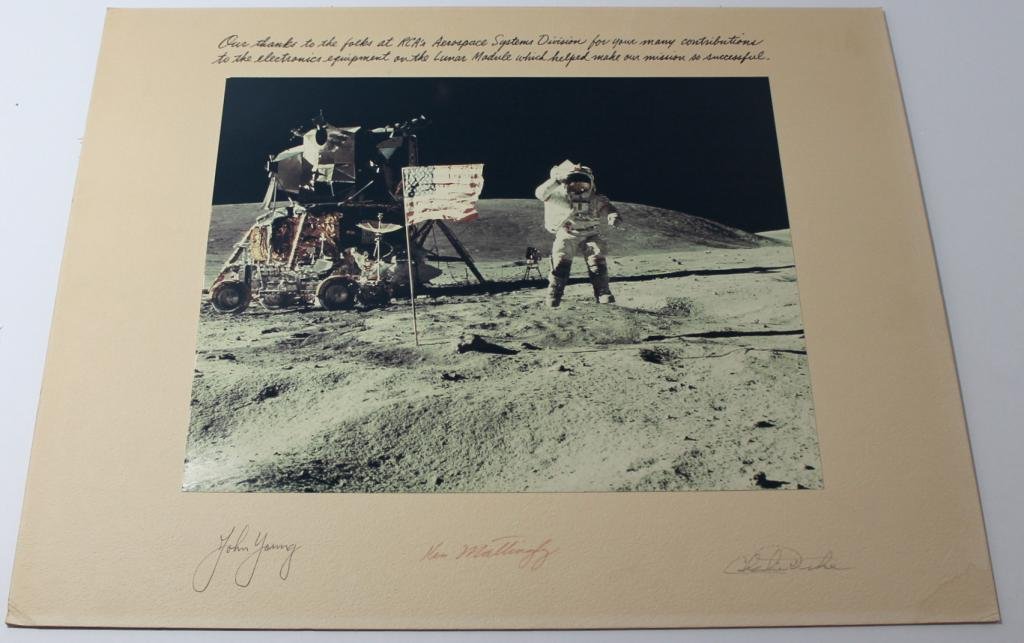 Apollo 16 Crew-Signed Matted RCA Photo: An 11"x 13.5" color glossy photo of a scene from the Apollo 16 mission attached to a 16"x 20" matte board, and presented to RCA's Aerospace Systems Division. Signed on the matte by the Apollo 16 crew